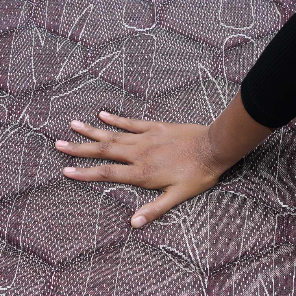 Close-up of dual comfort surface – soft quilted fabric with breathable texture by sleep with durest